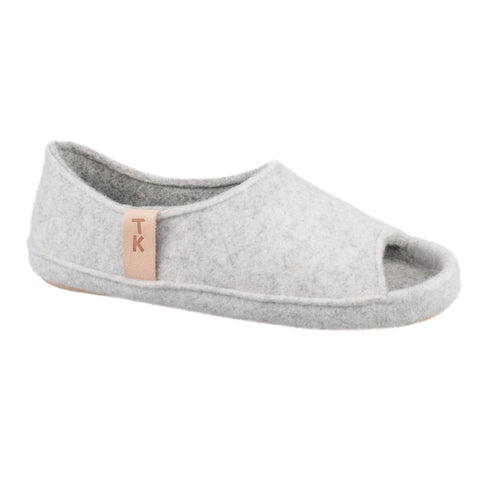 3. Side view of unisex TOKU Bern white slipper by Omaking, highlighting TK branding and breathable design