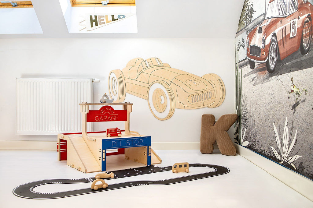 1. Children's room with wooden retro car wall decoration and play garage set on white walls