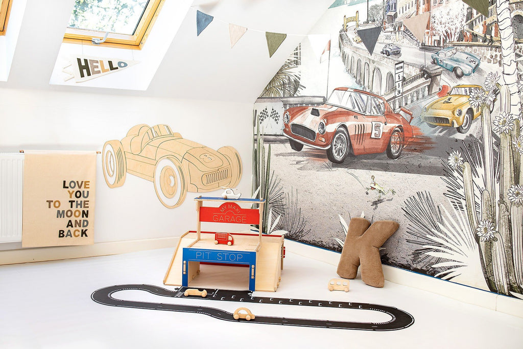 6. Children's room with wooden retro car wall decoration, play garage, and car mural