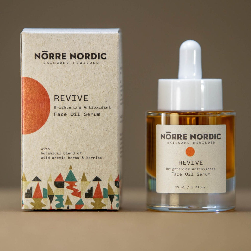 7. Nörre Nordic REVIVE Face Oil Serum bottle and packaging with botanical design