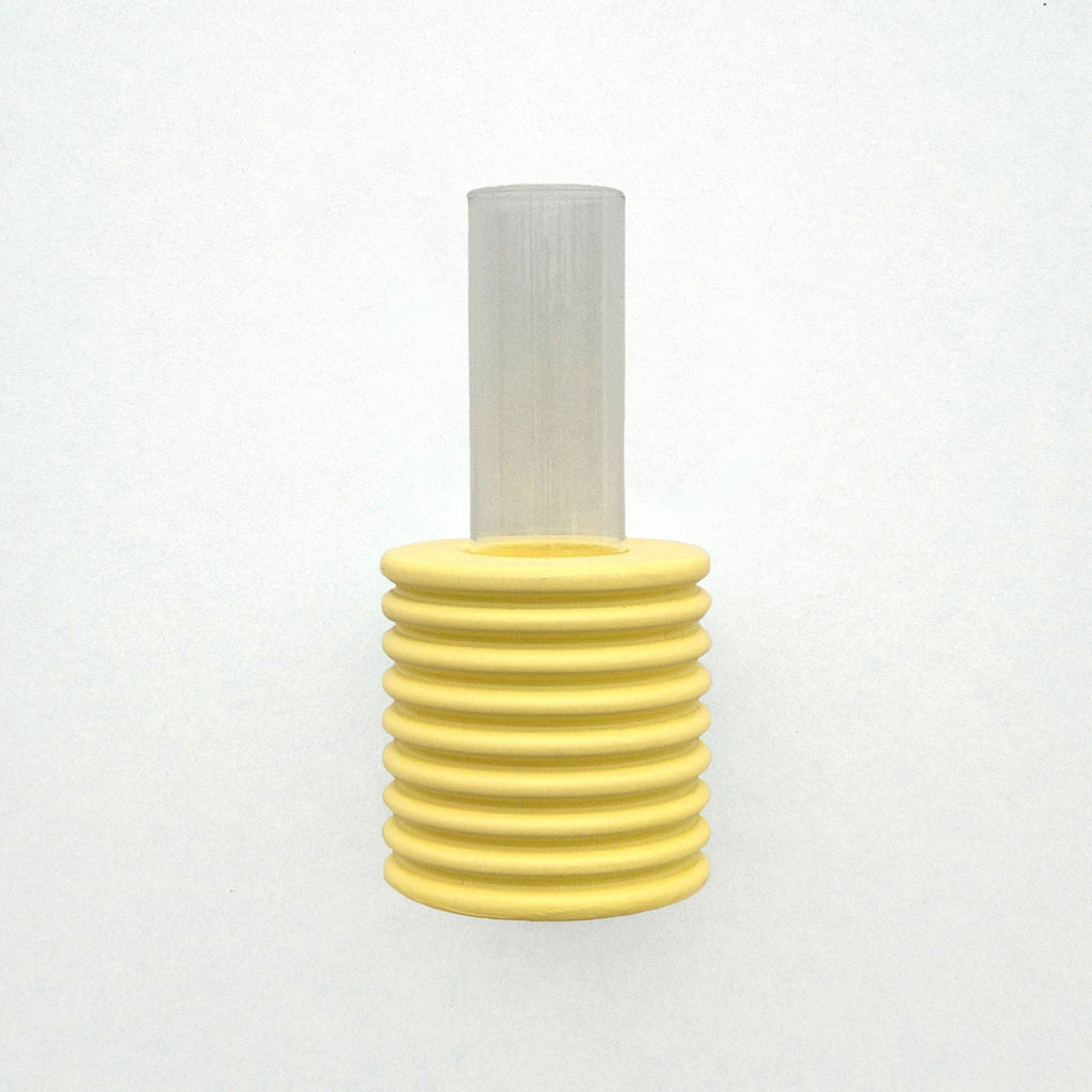 4. Studio shot of yellow Ribble Wall Vase by 5mm Paper, highlighting beech wood and water-based paint
