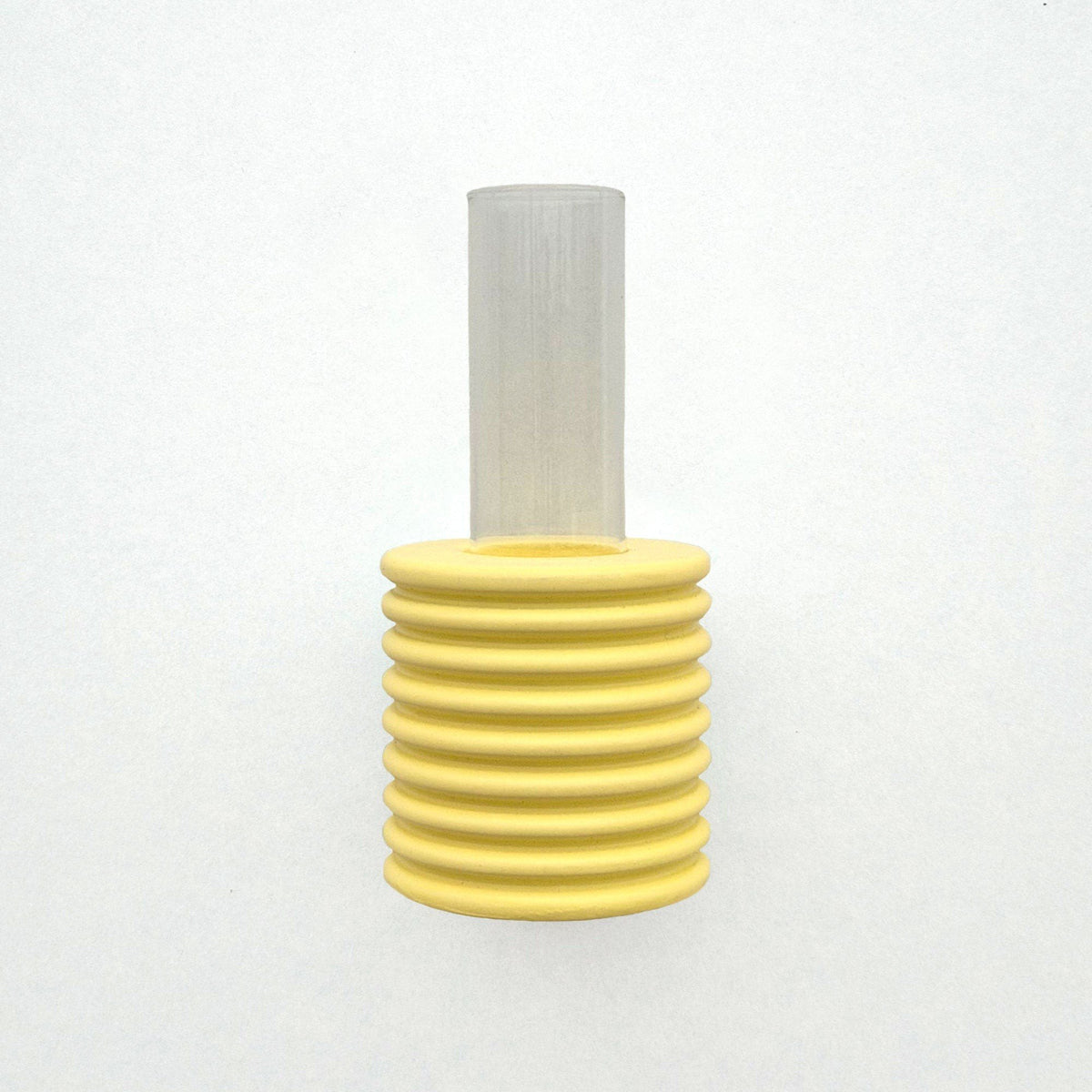 4. Studio shot of yellow Ribble Wall Vase by 5mm Paper, highlighting beech wood and water-based paint