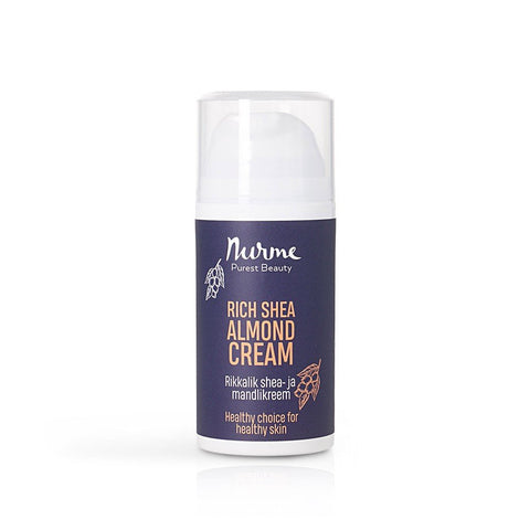 2. Nurme Rich Shea Almond Cream in 100ml bottle with dark blue label and white cap, featuring product name and brand logo, shown in studio setting