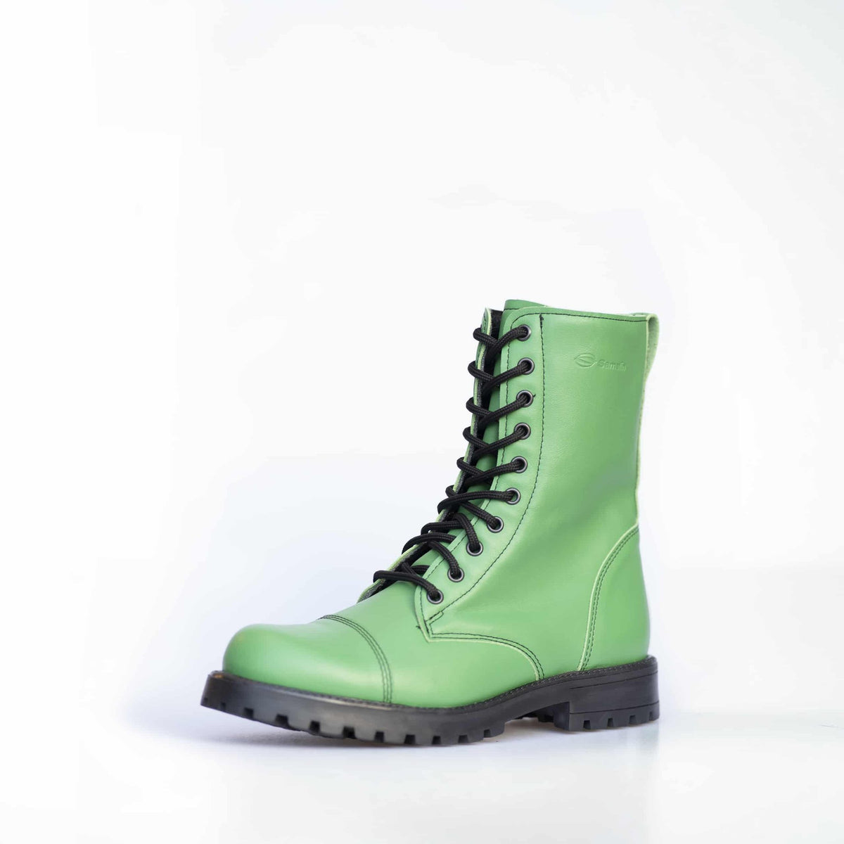 2. Unisex green Samelin 511 Granny Smith boots with zipper, angled front view in studio