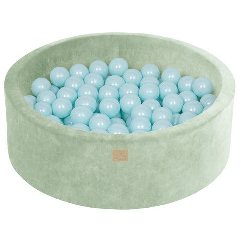 2. Sage velvet round ball pit filled with 200 baby blue balls, featuring hypoallergenic foam construction and machine washable cover, ideal for children's sensory play and motor skill development.