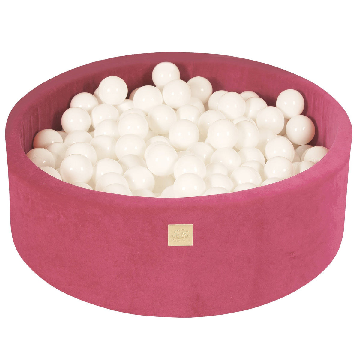 1. Raspberry red velvet round ball pit filled with 200 white balls, featuring a soft hypoallergenic foam structure, ideal for children's sensory play and motor skill development.