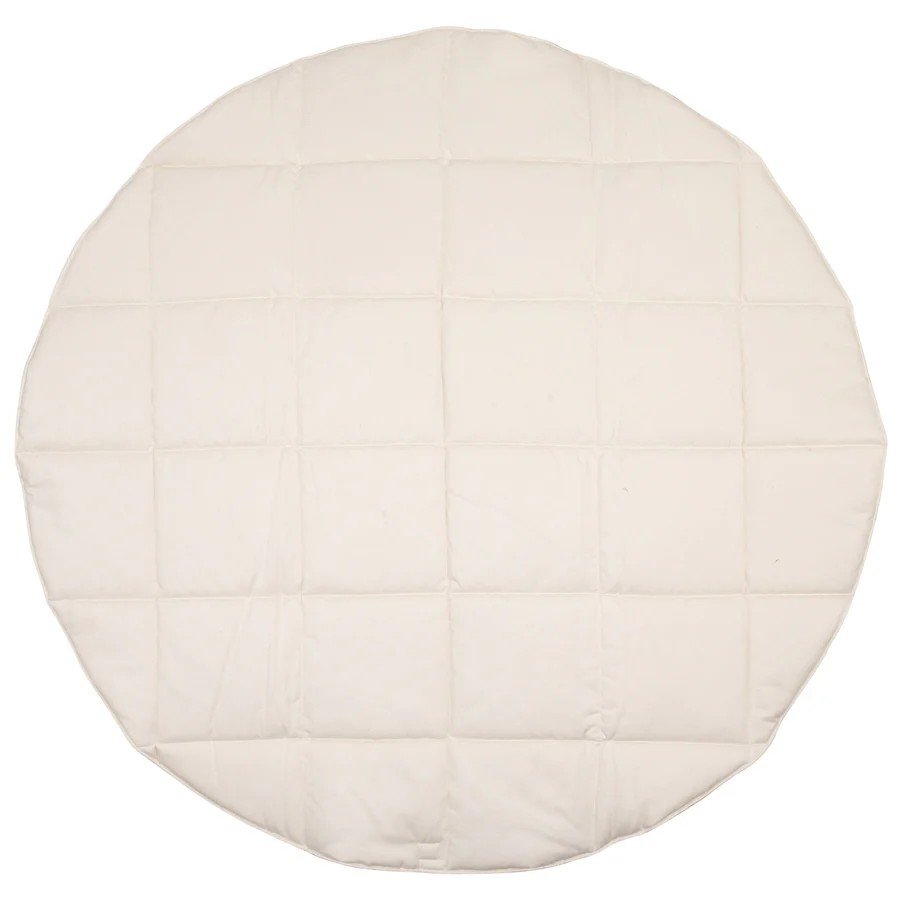 4. Flat lay of round quilted cotton mat in plain beige, showing stitching detail