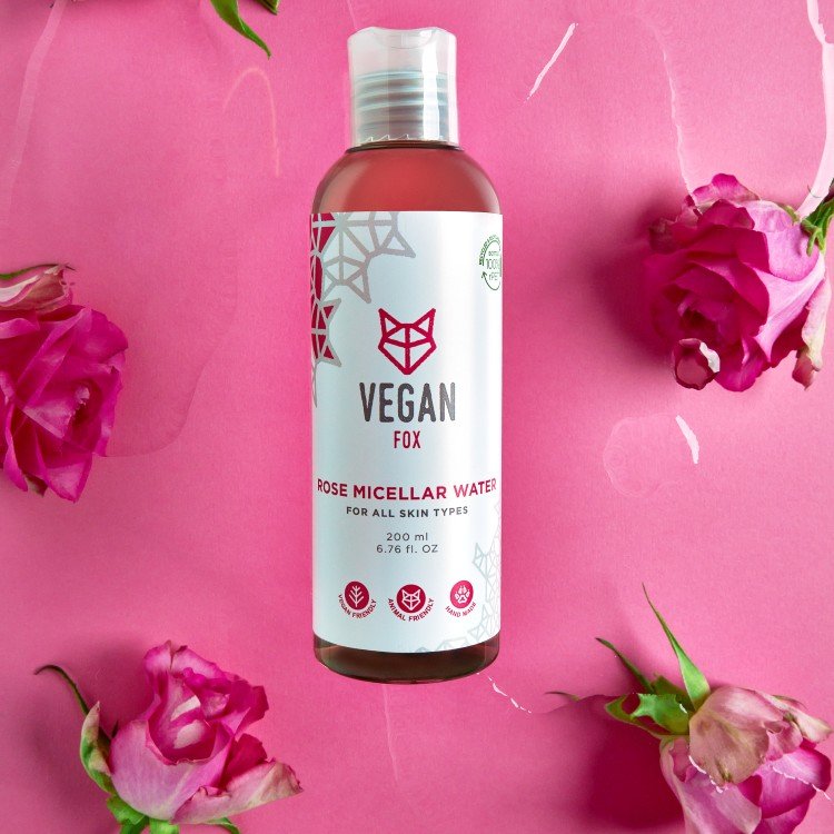 4. Vegan Fox Rose Micellar Water bottle on pink background with roses, emphasizing floral essence