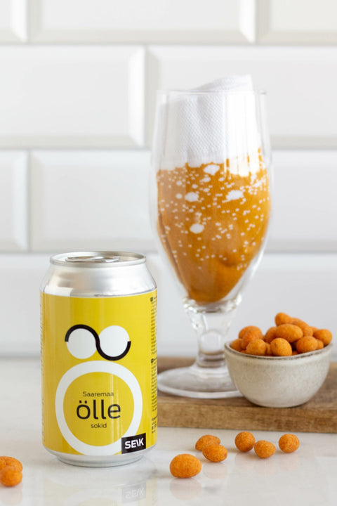 5. SEIK Saaremaa öllesokid in beer glass with can and snacks, highlighting creative presentation
