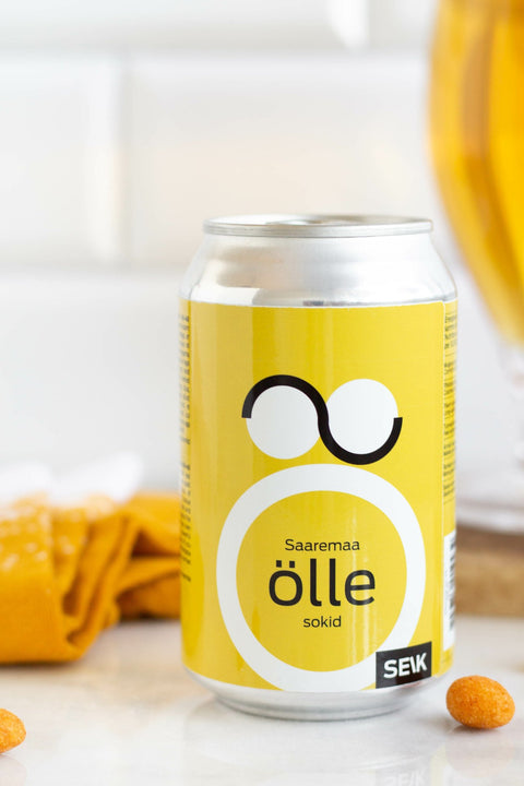3. SEIK Saaremaa öllesokid can with socks in background, emphasizing branding and packaging