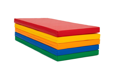 2. Stack of five multicolor mats in red, yellow, orange, blue, and green, shown in studio setting