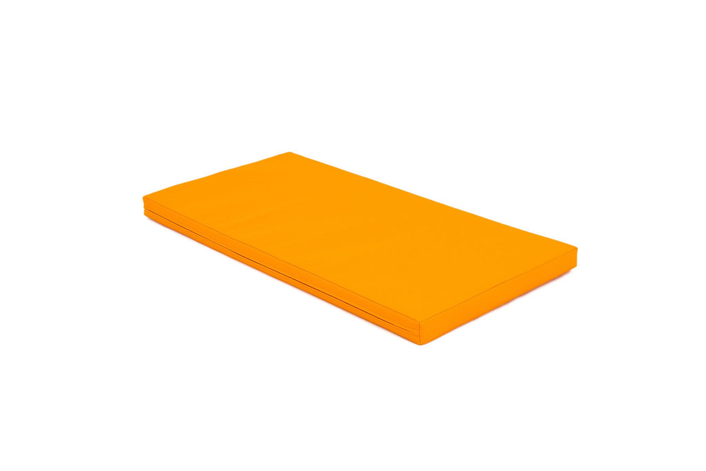 2. Single orange mat shown in studio setting