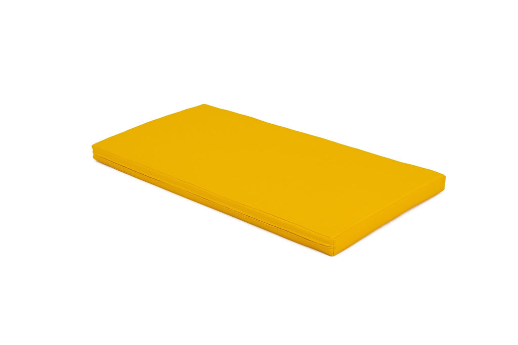 2. Single yellow mat shown in studio setting
