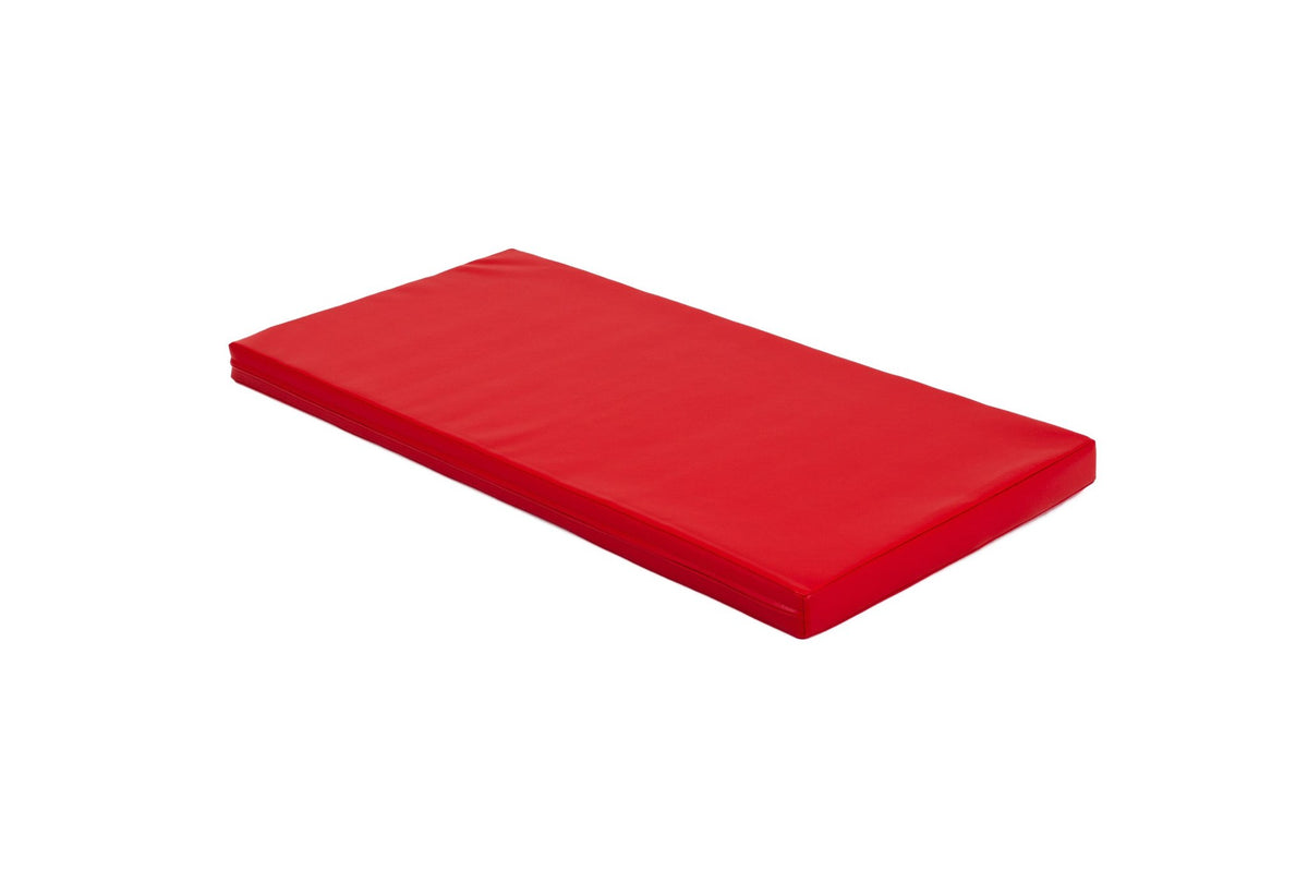 2. Single red mat shown in studio setting