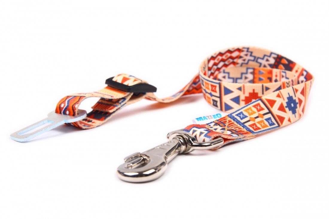 3. Close-up of Matteo boho safety belt for dogs showing metal clip and colorful geometric pattern