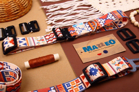 4. Detail shot of Matteo boho safety belt for dogs with brand tag and colorful pattern alongside crafting materials