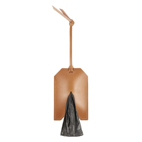 2. Camel-colored leather bag dispenser with black bag protruding, featuring a strap for attachment, shown against a white background