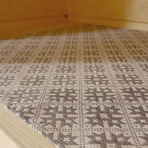 2. Close-up of sauna bench seating pad featuring Pärnu County mitten pattern on linen-cotton blend