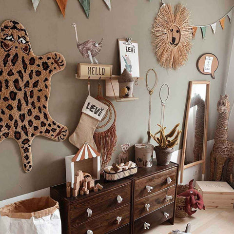 3. Children's room with Savanna Wonderland wallstickers, featuring ostrich and lion decor on wall above dresser