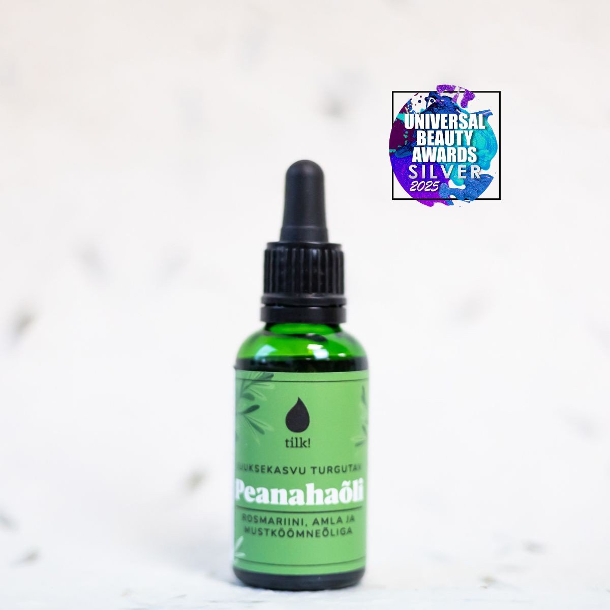 1. Tilk! Scalp Oil for boosting hair growth, 30ml, with award badge, featuring black cumin and rosemary extracts