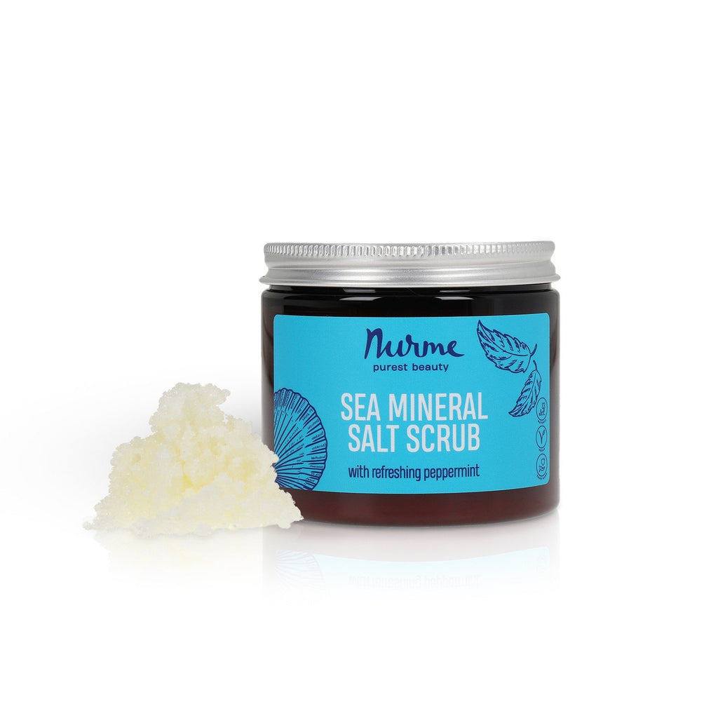 1. Nurme Sea Mineral Salt Scrub jar with blue label and peppermint illustration, shown with scrub texture on white background