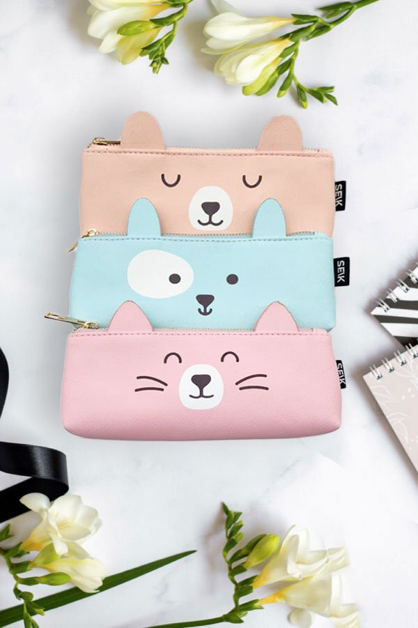 2. Trio of SEIK pencil cases featuring Happy Cat, bear, and dog designs in pink, beige, and blue faux leather