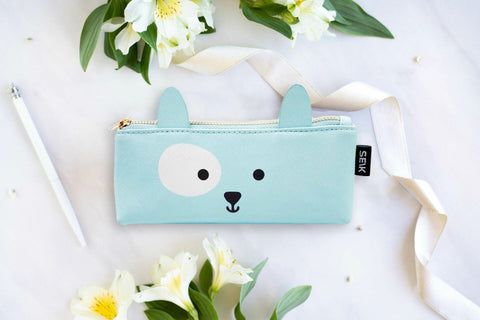 1. SEIK pastel blue Happy Puppy pencil case with faux leather material, shown with flowers and ribbon