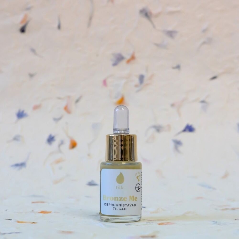 1. Tilk! Self-Tanning Drops with algae extract and hyaluronic acid, 15ml, shown in a lifestyle setting