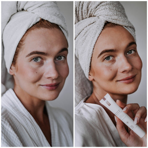 1. Woman with towel on head holding LUUV Self-Tanning Face Serum, showing radiant skin