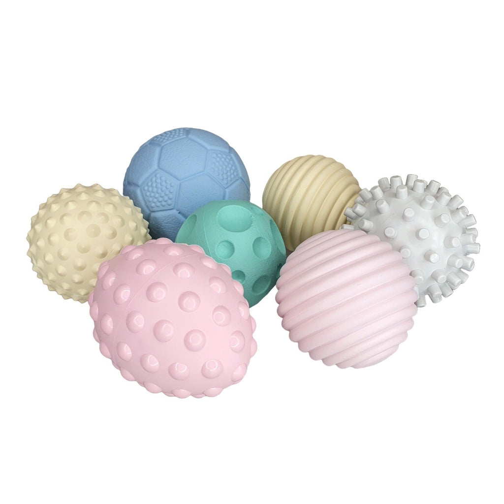 2. Set of seven pastel-colored sensory balls for babies, each with a unique texture, designed to enhance motor skills and sensory perception.
