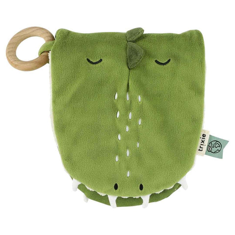 1. Green Trixie Baby Mr. Dino sensory book with wooden ring, organic cotton material, and embroidered eyes