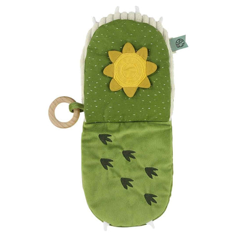 4. Open Trixie Baby Mr. Dino sensory book with yellow sun design and dinosaur footprints on green fabric