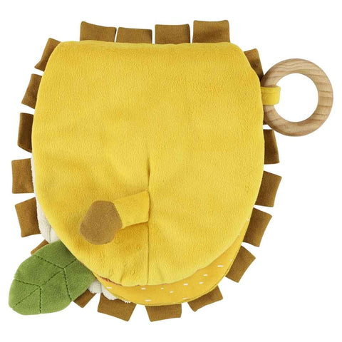 3. Side view of Trixie Baby Mr. Lion sensory book highlighting soft yellow fabric and wooden ring