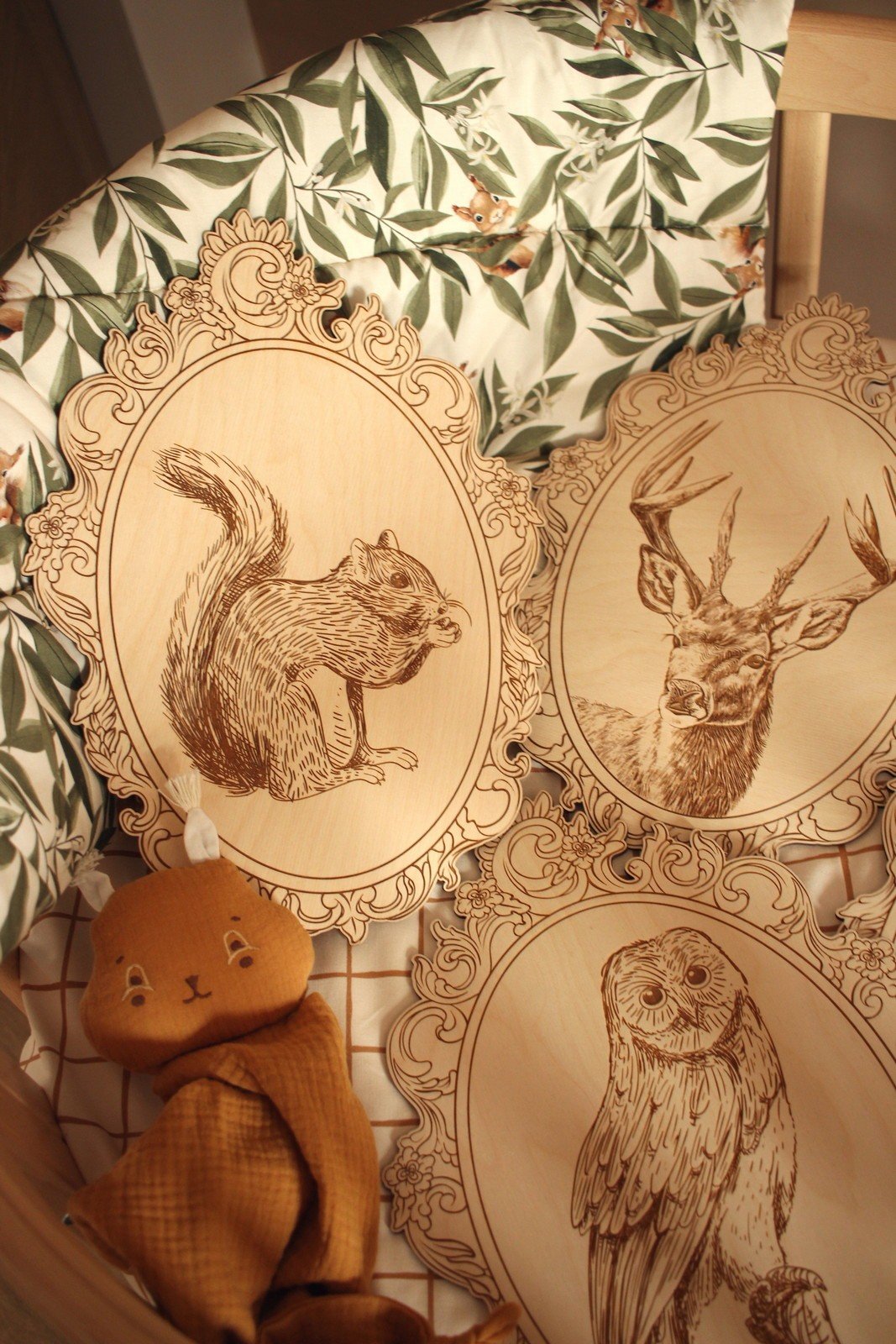 7. Set of engraved squirrel, deer, and owl pictures in retro frames on patterned fabric