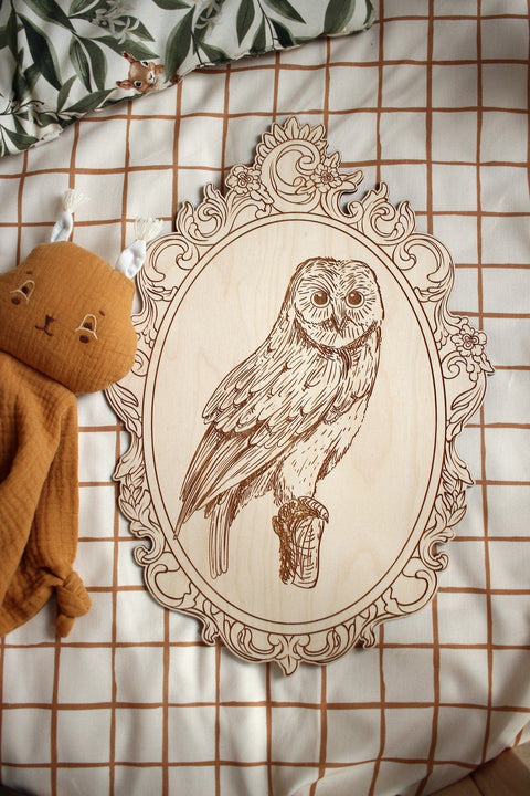 5. Engraved owl picture in retro frame on checkered fabric with plush toy