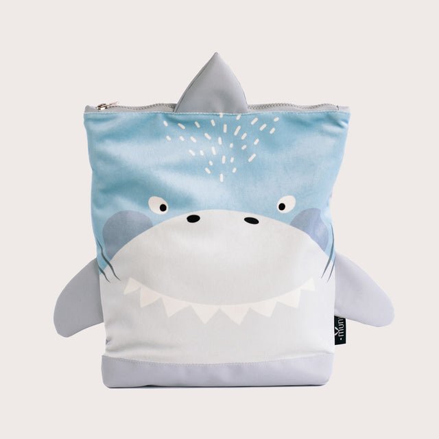 6. Close-up of Muni shark backpack's face design, highlighting playful features