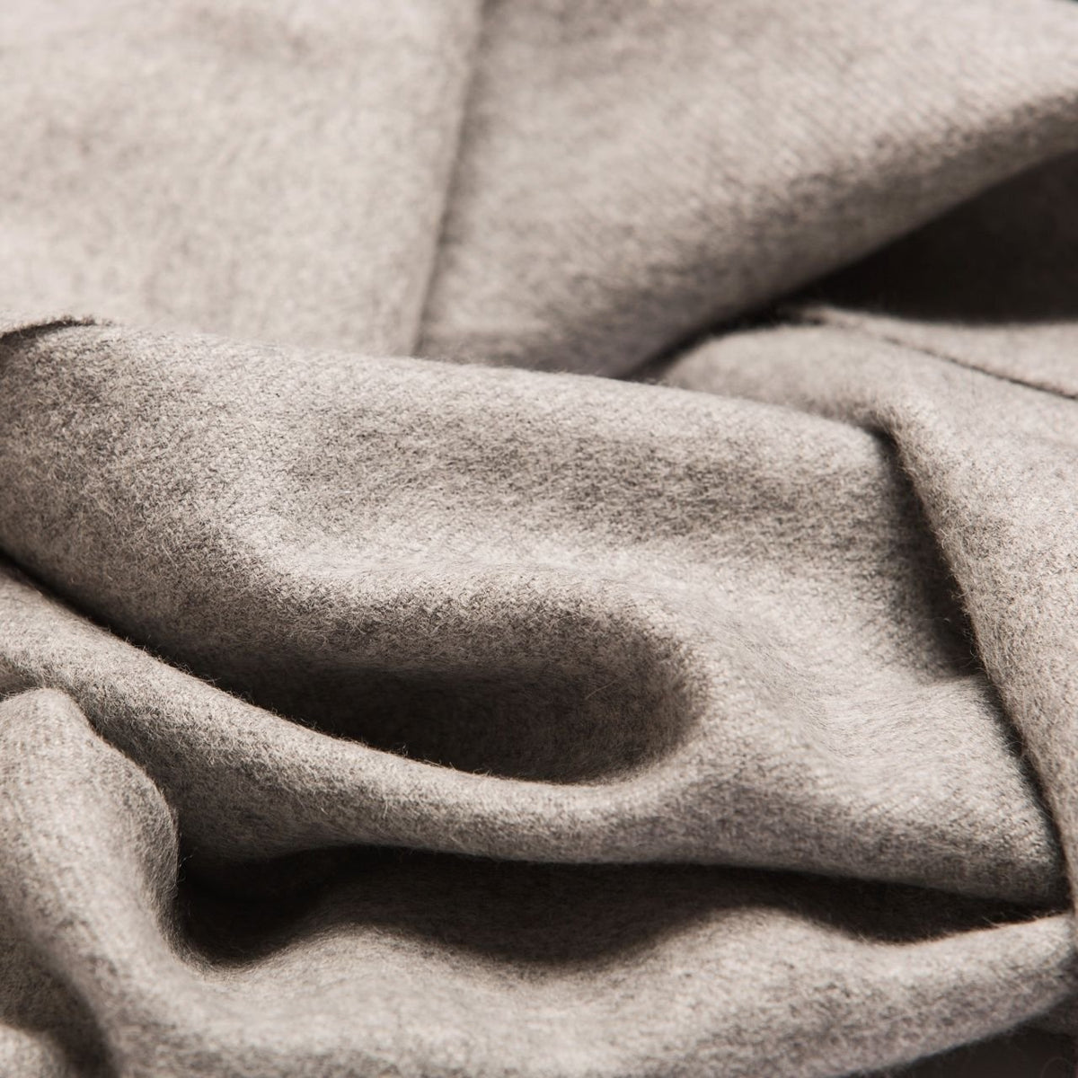 13. Close-up of Alpaka natural baby alpaca fabric in grey, showing texture and softness
