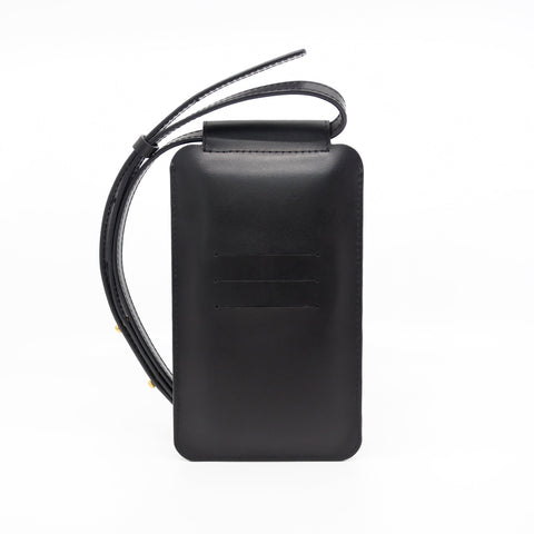 3. Studio image of Tairi Roosve black leather phone bag with adjustable strap and card slots