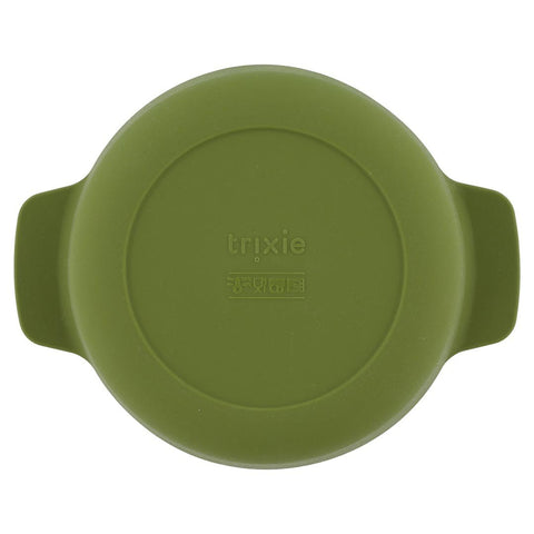 2. Bottom view of green silicone bowl showing Trixie logo and safety symbols