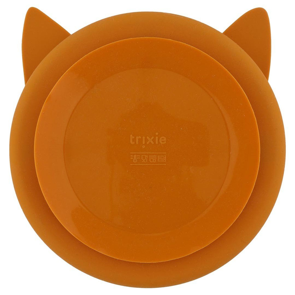 2. Back view of orange silicone suction plate with Trixie logo, showcasing strong suction base for secure placement.