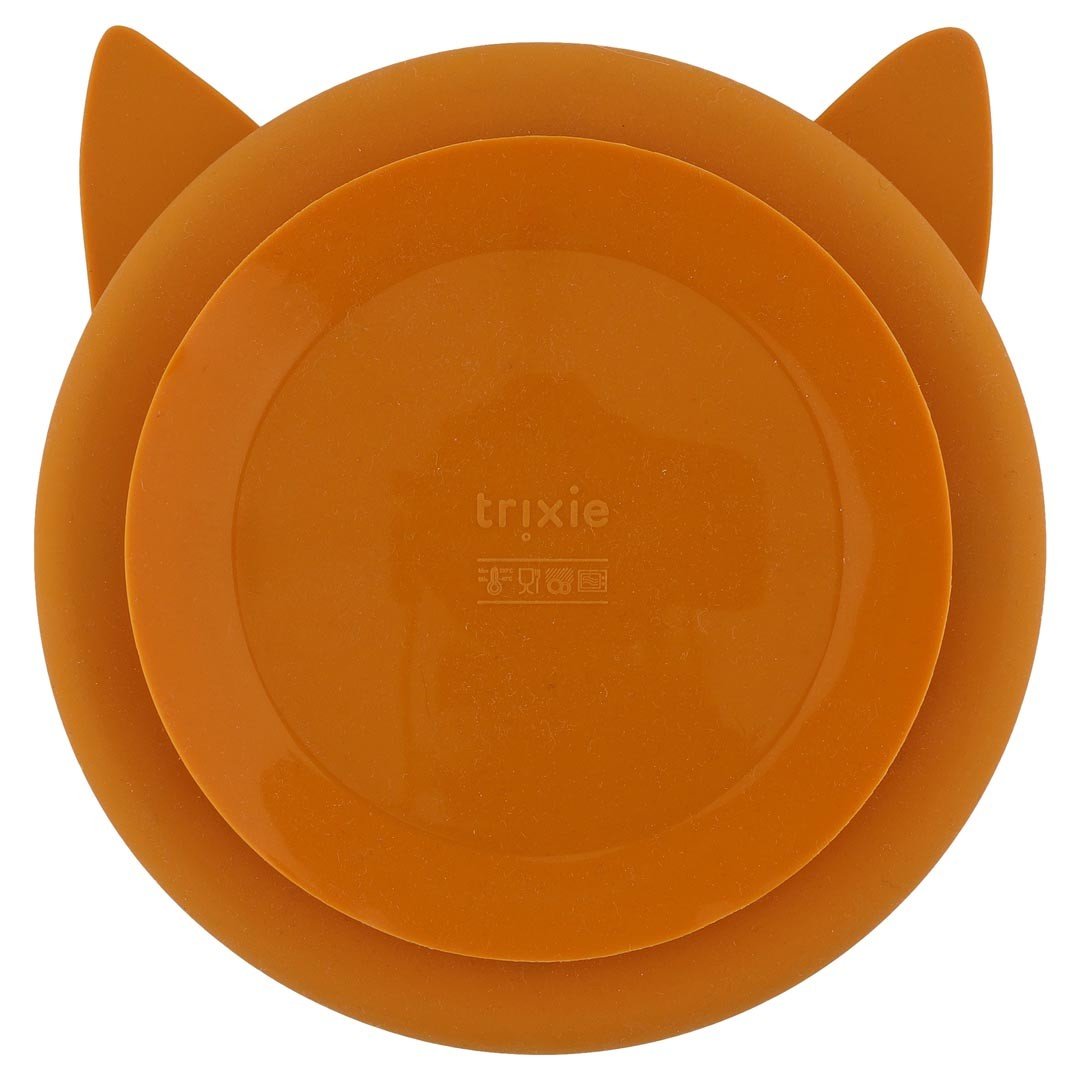 2. Back view of orange silicone suction plate with Trixie logo, showcasing strong suction base for secure placement.