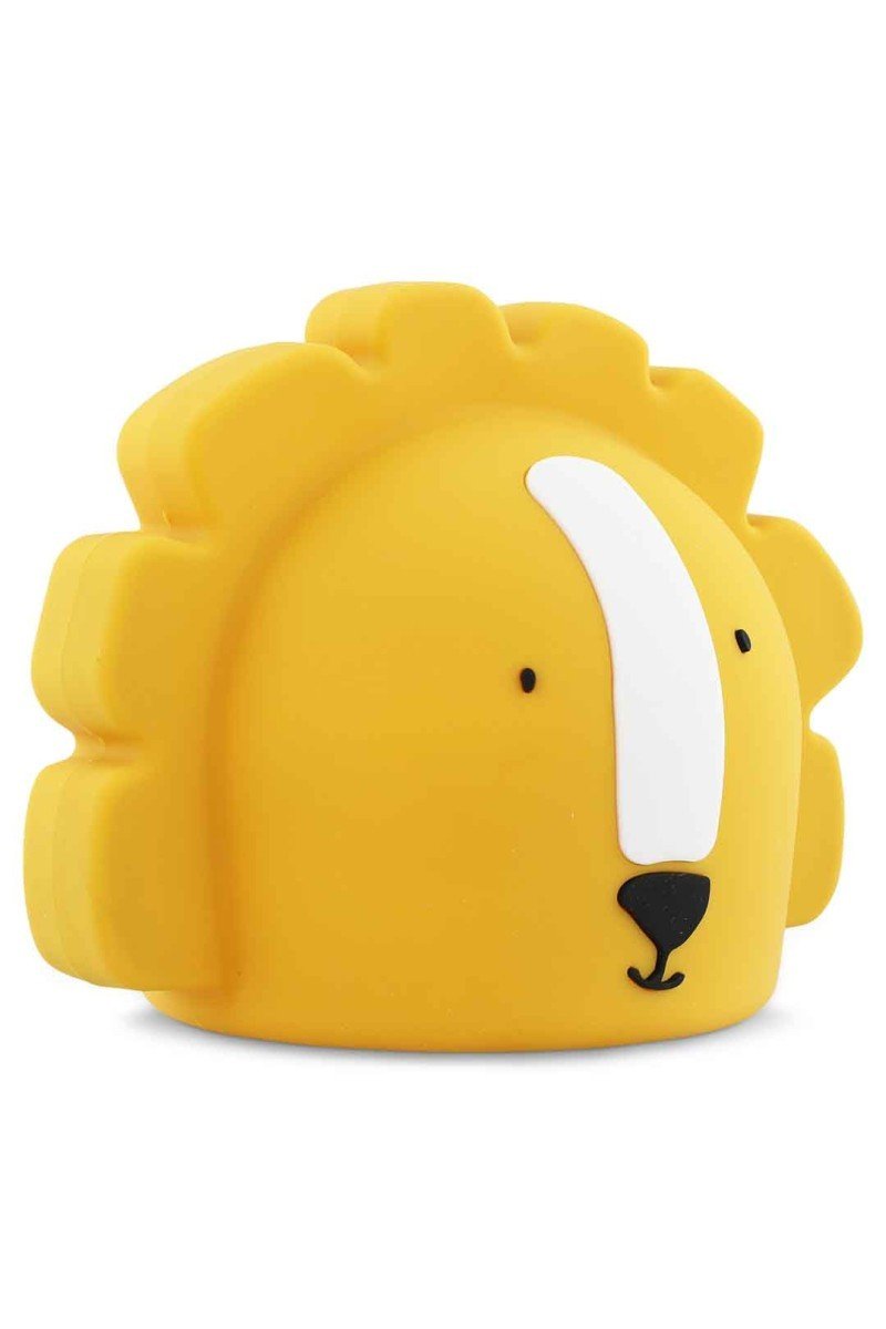 2. Side angle of Trixie Baby's Mr. Lion silicone night light in yellow, highlighting the mane and facial features
