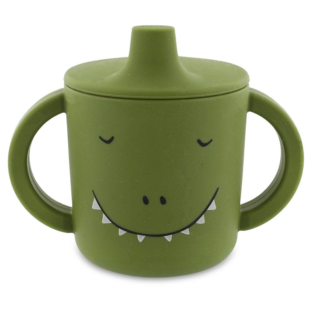 2. Green silicone sippy cup with dinosaur face design and big handles, shown from front on white background