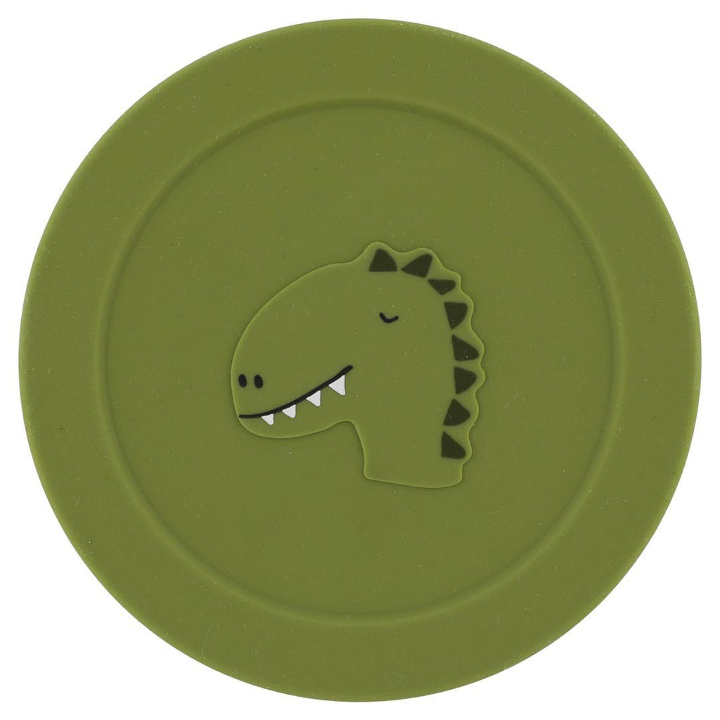 4. Top view of green silicone lid with dinosaur design, part of snack container by Trixie Baby