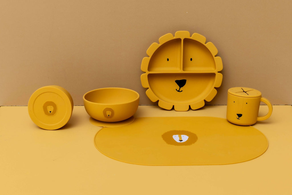 7. Collection of Trixie Baby products featuring Mr. Lion design, including snack container, bowl, plate, and cup