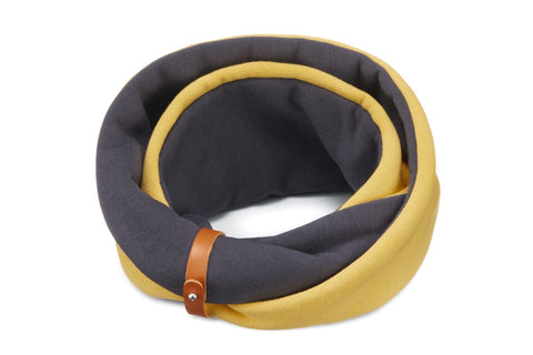 2. Labbvenn Simo neck warmer in gold and iron with leather belt on white background