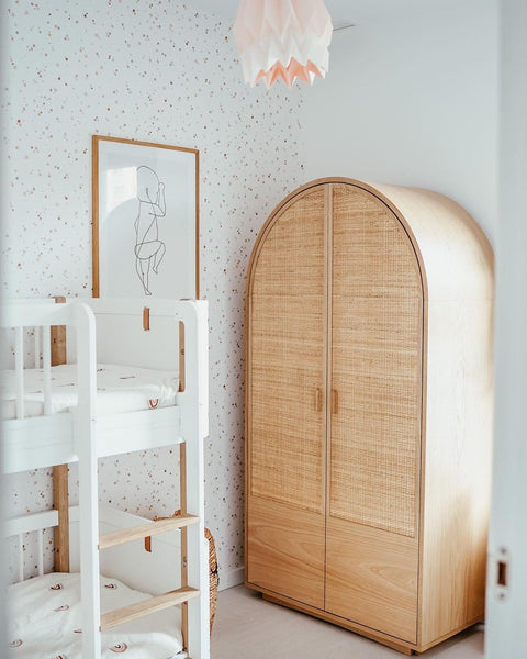 1. Children's room with bunk bed and arched wardrobe, featuring Dekornik Simple Dots Minimini wallpaper