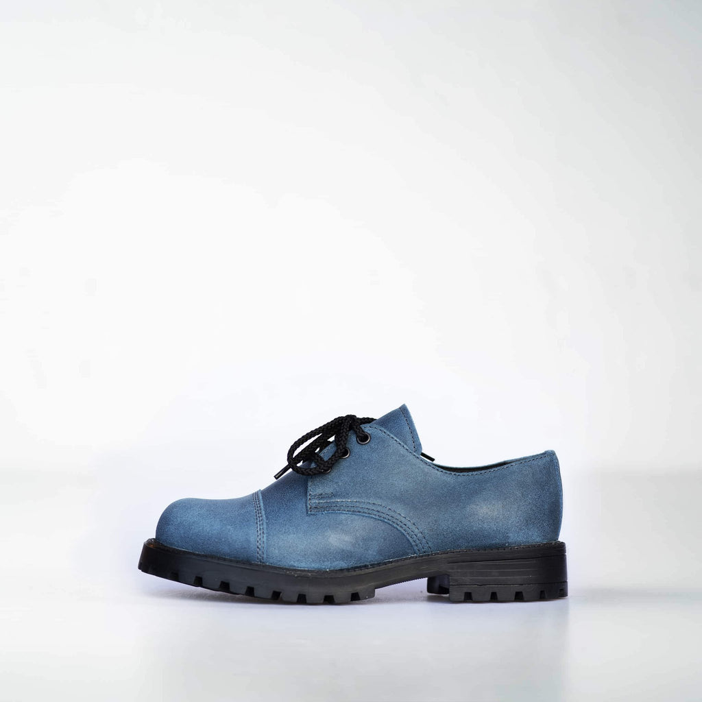 3. Studio shot of Samelin Blue Widgets unisex sneakers in blue leather, featuring direct-injected PU outsole