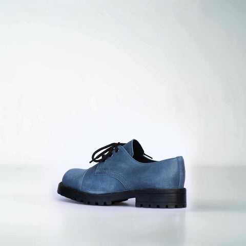 2. Side view of Samelin Blue Widgets unisex sneakers in blue leather with black laces, highlighting rugged design