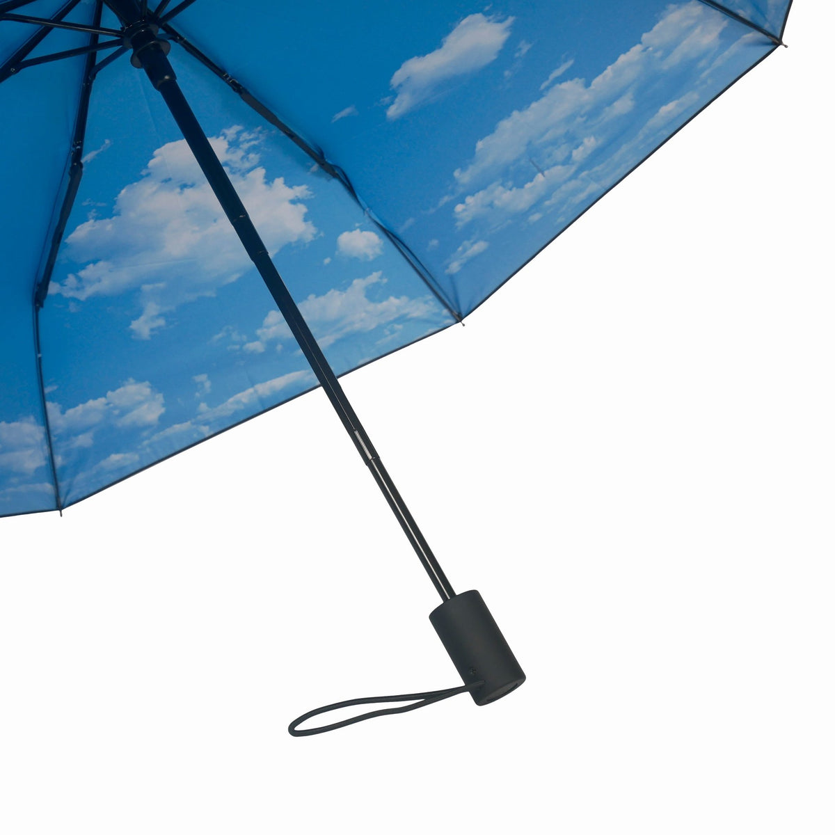 8. Close-up of Sky Lake umbrella handle with blue cloud print interior